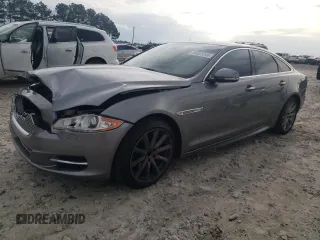 2012 Jaguar XJ with VIN SAJWA1CB6CLV23313, listed as a Copart auction lot 44023245 with 138,197 mi miles and Salvage Title. Bid and sale history available at DreamBid. Image 1.