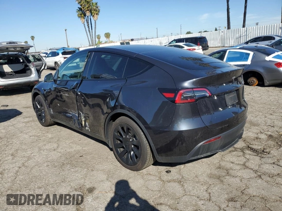 2024 Tesla Model Y Long Range z VIN 7SAYGAEE2RF009616, wystawiony jako Copart lot #46139805 z przebiegiem 6 535 mil mil oraz Szkoda całkowita • Salvage title. Historia ofert i sprzedaży dostępna na DreamBid. Obrazek 2.