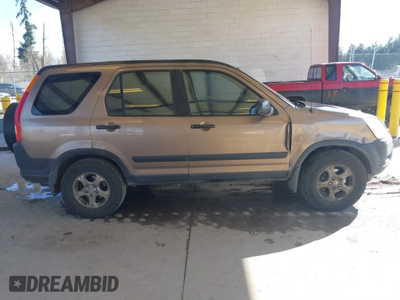 2002 Honda CR-V LX z VIN JHLRD78512C007757, wystawiony jako IAAI lot #41885302 z przebiegiem 177 892 mil mil oraz . Historia ofert i sprzedaży dostępna na DreamBid. Obrazek 13.