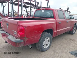 2010 Dodge Dakota with VIN 1D7CE3GP0AS166078, listed as a IAAI auction lot 41856634 with 235,615 mi miles and . Bid and sale history available at DreamBid. Image 4.