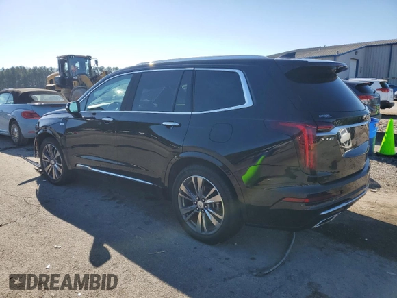 2021 Cadillac XT6 Premium Luxury z VIN 1GYKPCRS8MZ108761, wystawiony jako Copart lot #87185084 z przebiegiem 39 701 mil mil oraz Szkody całkowita. Historia ofert i sprzedaży dostępna na DreamBid. Obrazek 2.