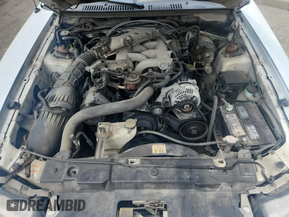 2000 Ford Mustang with VIN 1FAFP404XYF130074, listed as a Copart auction lot 60874945 with 233,035 mi miles and Non repairable. Bid and sale history available at DreamBid. Image 11.