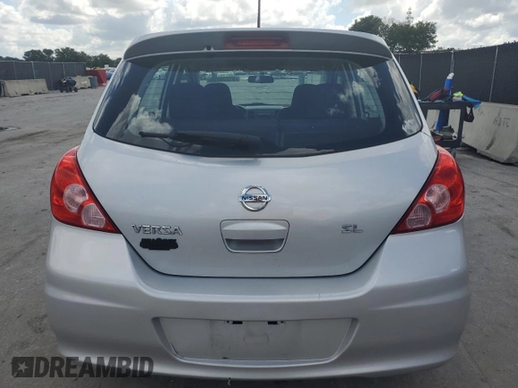 2011 Nissan Versa S with VIN 3N1BC1CP3BL492448, listed as a Copart auction lot 61236095 with 163,063 mi miles and Salvage title. Bid and sale history available at DreamBid. Image 6.