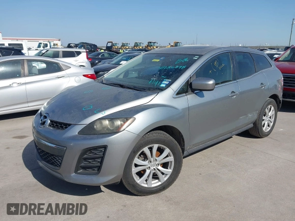 2010 Mazda CX-7 Touring z VIN JM3ER2W30A0319755, wystawiony jako IAAI lot #41786798 z przebiegiem 182 282 mil mil oraz . Historia ofert i sprzedaży dostępna na DreamBid. Obrazek 2.