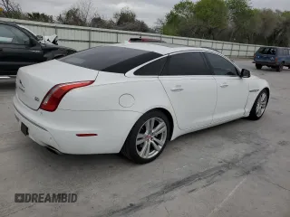 2014 Jaguar XJ Portfolio with VIN SAJWJ2GD6E8V65987, listed as a Copart auction lot 50091105 with 136,080 mi miles and Clean title. Bid and sale history available at DreamBid. Image 3.