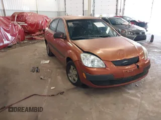 2009 Kia Rio LX with VIN KNADE223796547229, listed as a IAAI auction lot 41947371 with 153,061 mi miles and . Bid and sale history available at DreamBid. Image 1.