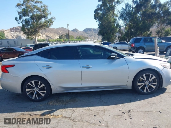 2017 Nissan Maxima Platinum with VIN 1N4AA6AP2HC414204, listed as a IAAI auction lot 42394624 with 80,486 mi miles and . Bid and sale history available at DreamBid. Image 13.