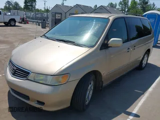 2000 Honda Odyssey EX with VIN 2HKRL1868YH001859, listed as a IAAI auction lot 42165724 with 209,393 mi miles and . Bid and sale history available at DreamBid. Image 2.