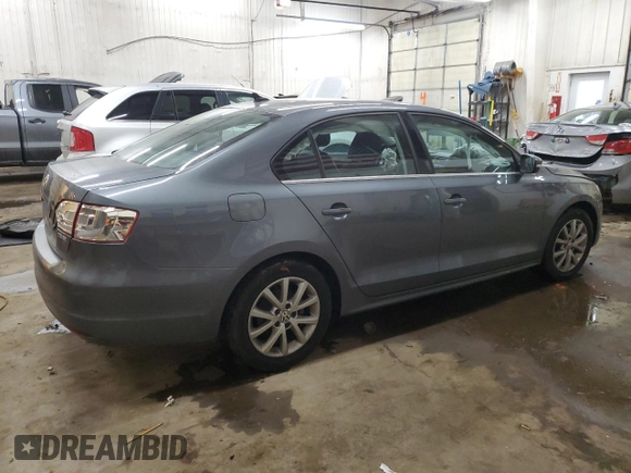 2013 Volkswagen Jetta SE with VIN 3VWDX7AJ2DM309725, listed as a Copart auction lot 86052114 with 70,828 mi miles and Salvage title. Bid and sale history available at DreamBid. Image 3.