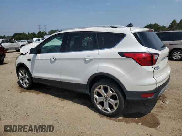 2019 Ford Escape Titanium z VIN 1FMCU9J93KUA51020, wystawiony jako Copart lot #60462495 z przebiegiem 59 998 mil mil oraz Szkoda całkowita • Salvage title. Historia ofert i sprzedaży dostępna na DreamBid. Obrazek 2.