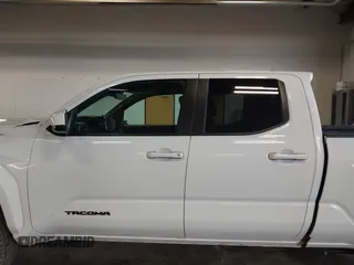 2025 Toyota Tacoma SR with VIN 3TMLB5JN2SM090394, listed as a IAAI auction lot 41916312 with 840 mi miles and . Bid and sale history available at DreamBid. Image 15.