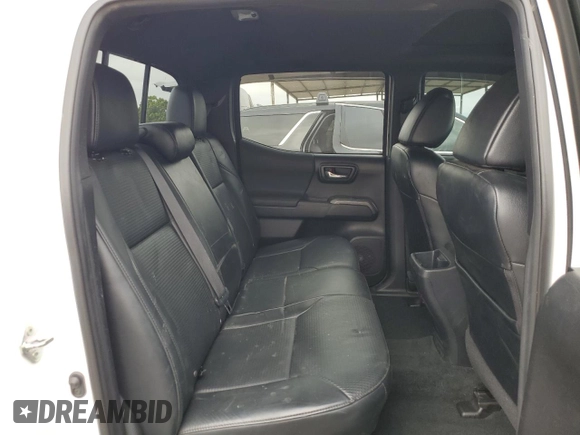 2018 Toyota Tacoma SR z VIN 3TMCZ5AN5JM181489, wystawiony jako Copart lot #55696365 z przebiegiem 70 091 mil mil oraz Szkoda całkowita • Salvage title. Historia ofert i sprzedaży dostępna na DreamBid. Obrazek 10.