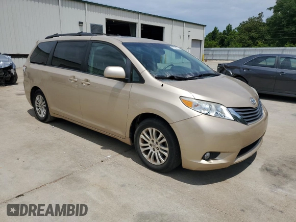 2012 Toyota Sienna XLE AAS with VIN 5TDYK3DC1CS277339, listed as a Copart auction lot 57494715 with 240,666 mi miles and Salvage title. Bid and sale history available at DreamBid. Image 4.