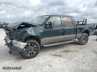 2002 Ford Super Duty F-250 XL with VIN 1FTNW21S02EA91664, listed as a Copart auction lot 72699094 with 392,973 mi miles and Salvage Title. Bid and sale history available at carsss.com. Image 1.
