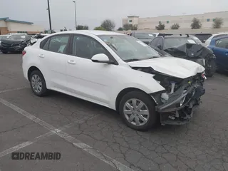 2021 Kia Rio LX with VIN 3KPA24AD3ME422560, listed as a IAAI auction lot 41005730 with 59,206 mi miles. Bid and sale history available at carsss.com. Image 1.