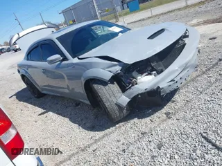 2021 Dodge Charger Scat Pack with VIN 2C3CDXGJ0MH565363, listed as a IAAI auction lot 41858375 with 20,720 mi miles and . Bid and sale history available at DreamBid. Image 1.