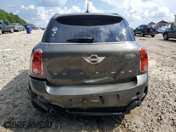 2014 MINI Countryman S with VIN WMWZC3C57EWP25099, listed as a Copart auction lot 62646555 with 153,059 mi miles and Salvage title. Bid and sale history available at DreamBid. Image 6.