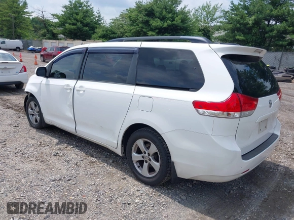 2013 Toyota Sienna LE AAS with VIN 5TDKK3DC6DS351233, listed as a IAAI auction lot 42652981 with 385,791 mi miles and . Bid and sale history available at DreamBid. Image 3.