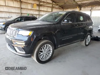 2018 Jeep Grand Cherokee Summit with VIN 1C4RJFJT4JC344141, listed as a Copart auction lot 57123685 with 86,893 mi miles and Salvage title. Bid and sale history available at DreamBid. Image 1.