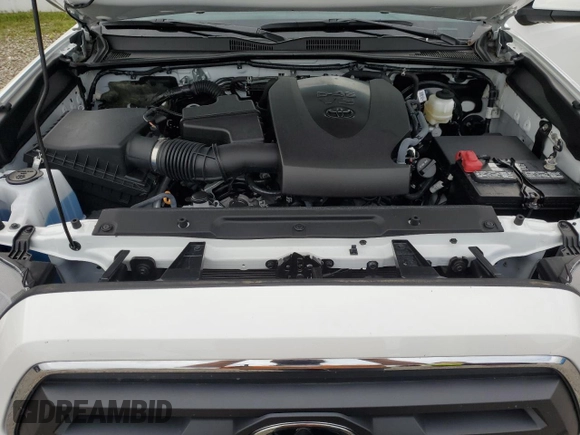 2023 Toyota Tacoma SR with VIN 3TMCZ5AN2PM642205, listed as a Copart auction lot 61045955 with 10,596 mi miles and Salvage title. Bid and sale history available at DreamBid. Image 11.