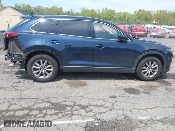 2019 Mazda CX-9 Touring z VIN JM3TCBCY6K0331905, wystawiony jako IAAI lot #42157842 z przebiegiem 84 211 mil mil oraz . Historia ofert i sprzedaży dostępna na DreamBid. Obrazek 14.