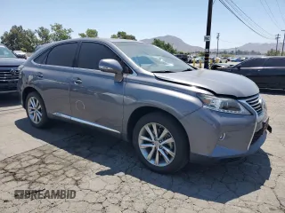 2015 Lexus RX 450h with VIN 2T2ZB1BA1FC001617, listed as a Copart auction lot 61766235 with 79,789 mi miles and Salvage title. Bid and sale history available at DreamBid. Image 4.