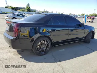 2004 Cadillac CTS-V z VIN 1G6DN57S440130637, wystawiony jako Copart lot #57805015 z przebiegiem 145 633 mil mil oraz Szkody całkowita. Historia ofert i sprzedaży dostępna na DreamBid. Obrazek 3.