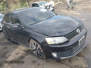 2012 Volkswagen Jetta GLI z VIN 3VW467AJ3CM406644, wystawiony jako IAAI lot #41512152 z przebiegiem 132 548 mil mil oraz . Historia ofert i sprzedaży dostępna na DreamBid. Obrazek 1.