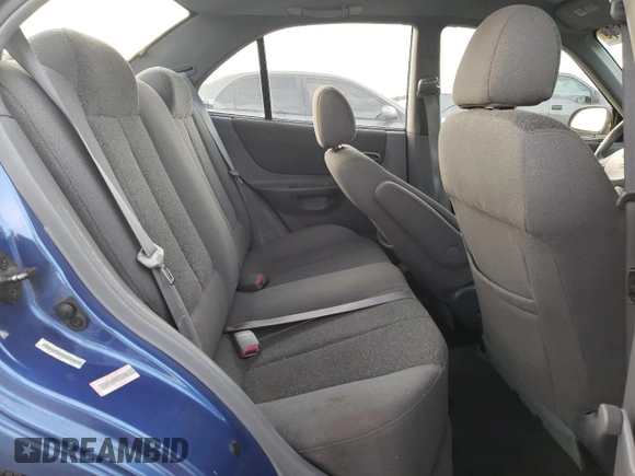 2000 Hyundai Accent z VIN KMHCG45GXYU125691, wystawiony jako Copart lot #87253294 z przebiegiem 91 062 mil mil oraz Szkoda całkowita • Salvage title. Historia ofert i sprzedaży dostępna na DreamBid. Obrazek 10.