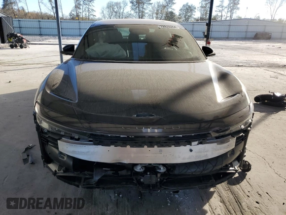 2024 Lucid Air Pure z VIN 50EA1PGA7RA001741, wystawiony jako Copart lot #79933954 z przebiegiem Nie podano mil oraz Szkoda całkowita • Salvage title. Historia ofert i sprzedaży dostępna na DreamBid. Obrazek 5.