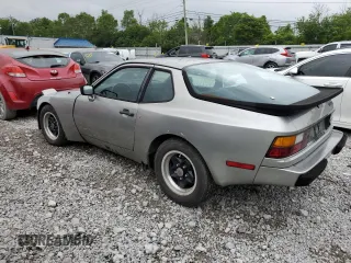 1983 Porsche 944 z VIN WP0AA0948DN453105, wystawiony jako Copart lot #58870185 z przebiegiem 96 753 mil mil oraz Czysty tytuł • Clean title. Historia ofert i sprzedaży dostępna na DreamBid. Obrazek 2.