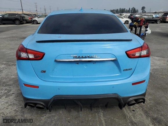 2014 Maserati Ghibli S Q4 with VIN ZAM57RTA7E1089301, listed as a Copart auction lot 69271994 with 58,318 mi miles and Salvage Title. Bid and sale history available at carsss.com. Image 6.