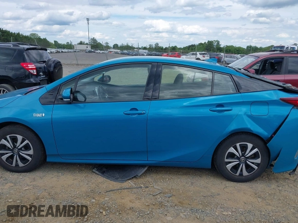 2017 Toyota Prius Plus z VIN JTDKARFP4H3067953, wystawiony jako IAAI lot #42211132 z przebiegiem 90 760 mil mil oraz . Historia ofert i sprzedaży dostępna na DreamBid. Obrazek 14.