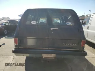 1991 Chevrolet Suburban z VIN 1GNGR26N2MF124400, wystawiony jako Copart lot #85809994 z przebiegiem 160 922 mil mil oraz Czysty tytuł • Clean title. Historia ofert i sprzedaży dostępna na DreamBid. Obrazek 6.