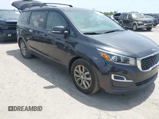 2020 Kia Sedona EX with VIN KNDMB5C14L6596843, listed as a IAAI auction lot 42074858 with 82,294 mi miles. Bid and sale history available at carsss.com. Image 1.