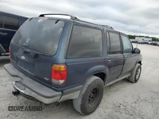 1998 Ford Explorer XLT with VIN 1FMZU32P0WUD21265, listed as a Copart auction lot 73702364 with 211,096 mi miles and Salvage title. Bid and sale history available at DreamBid. Image 3.