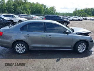 2013 Volkswagen Jetta S with VIN 3VW2K7AJ5DM285488, listed as a IAAI auction lot 42521944 with 132,655 mi miles and . Bid and sale history available at DreamBid. Image 14.