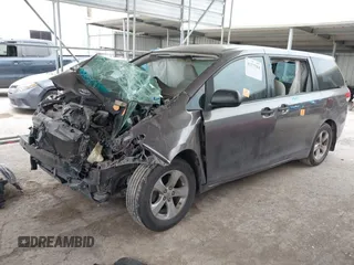 2014 Toyota Sienna L with VIN 5TDZK3DC5ES475204, listed as a IAAI auction lot 41277584 with 125,735 mi miles. Bid and sale history available at carsss.com. Image 2.