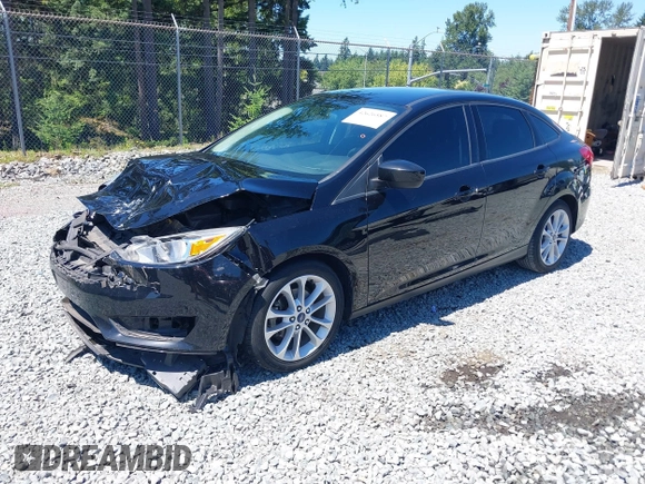 2018 Ford Focus SE z VIN 1FADP3FE5JL279274, wystawiony jako IAAI lot #42626587 z przebiegiem 92 110 mil mil oraz . Historia ofert i sprzedaży dostępna na DreamBid. Obrazek 19.