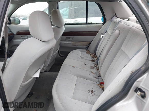 2004 Mercury Grand Marquis GS with VIN 2MEFM74W84X634345, listed as a IAAI auction lot 41920110 with 97,749 mi miles and . Bid and sale history available at DreamBid. Image 8.