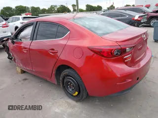 2015 Mazda 3 i Touring z VIN 3MZBM1V72FM171540, wystawiony jako IAAI lot #42437378 z przebiegiem 135 392 mil mil oraz . Historia ofert i sprzedaży dostępna na DreamBid. Obrazek 3.