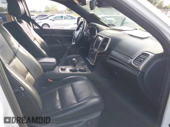 2014 Jeep Grand Cherokee Summit с VIN 1C4RJFJT7EC393419, выставлен на аукционе IAAI как лот 42759714 с пробегом 112 835 миль миль и . История ставок и продаж доступна на DreamBid. Изображение 5.