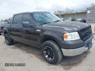 2005 Ford F-150 XLT with VIN 1FTPW12535KF05473, listed as a IAAI auction lot 42140281 with 163,023 mi miles. Bid and sale history available at carsss.com. Image 1.