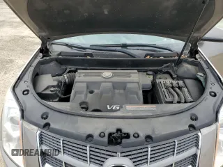 2011 Cadillac SRX Luxury Collection z VIN 3GYFNAEY8BS619208, wystawiony jako Copart lot #58321585 z przebiegiem 176 560 mil mil oraz Nie do naprawy • Non repairable. Historia ofert i sprzedaży dostępna na DreamBid. Obrazek 11.