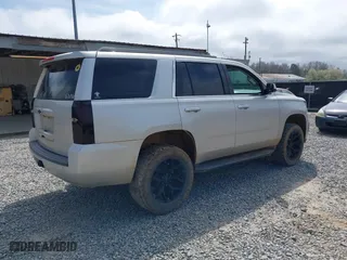 2016 Chevrolet Tahoe LS with VIN 1GNSCAKC5GR354722, listed as a IAAI auction lot 41812839 with 146,533 mi miles. Bid and sale history available at carsss.com. Image 4.