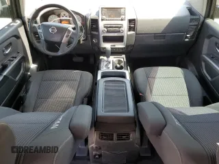 2015 Nissan Titan Pro-4X with VIN 1N6BA0EC1FN507491, listed as a Copart auction lot 51240915 with 165,510 mi miles and Salvage title. Bid and sale history available at DreamBid. Image 8.