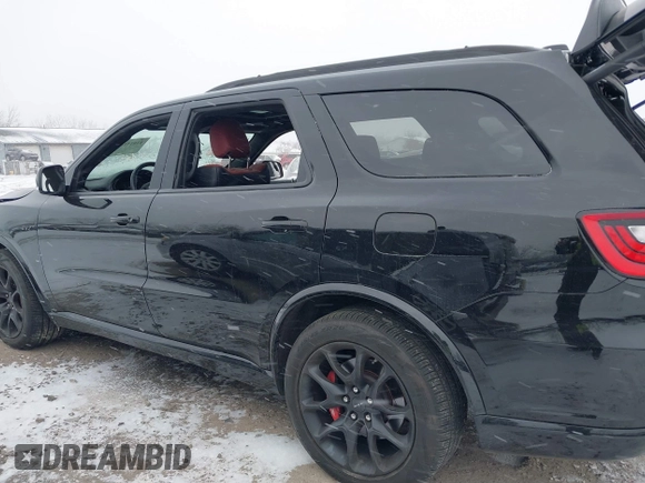2023 Dodge Durango SRT 392 Premium with VIN 1C4SDJGJXPC681939, listed as a IAAI auction lot 41015100 with 12,562 mi miles and . Bid and sale history available at DreamBid. Image 14.
