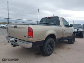 1999 Ford F-150 Work Series with VIN 1FTRF17WXXKA74403, listed as a IAAI auction lot 41525113 with 1 mi miles. Bid and sale history available at carsss.com. Image 4.