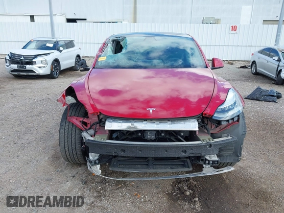 2020 Tesla Model Y Long Range with VIN 5YJYGDEE9LF009957, listed as a IAAI auction lot 41780248 with 31,053 mi miles and . Bid and sale history available at DreamBid. Image 13.