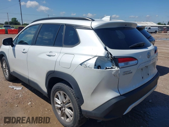2022 Toyota Corolla Cross LE z VIN 7MUCAAAG0NV014812, wystawiony jako IAAI lot #42335853 z przebiegiem 52 811 mil mil oraz . Historia ofert i sprzedaży dostępna na DreamBid. Obrazek 3.